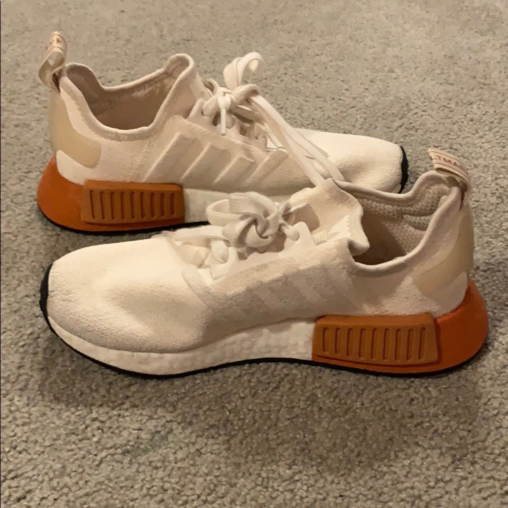 light pink and burnt orange adidas NMD’s